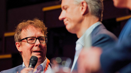 Professor Dr. Justus Haucap auf der Bühne von VISION.A