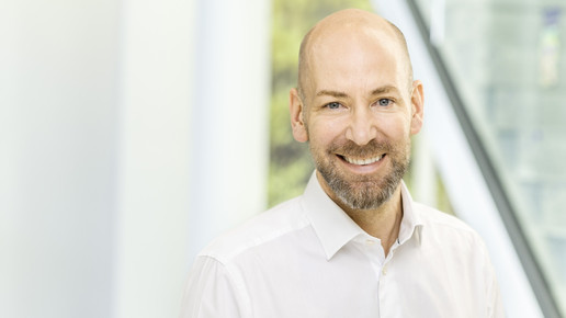 Manager Dr. Ingo Jurk lächelt.