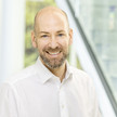 Wechsel bei Promedico Manager Dr. Ingo Jurk lächelt.