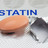 Foto: Tablette auf einem Blister mit Aufschrift Statin