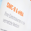 Werbeslogan von Medisign zu SMC-B und eHBA. Subslogan: "Ihre Eintrittskarte in die vernetzte Medizin"