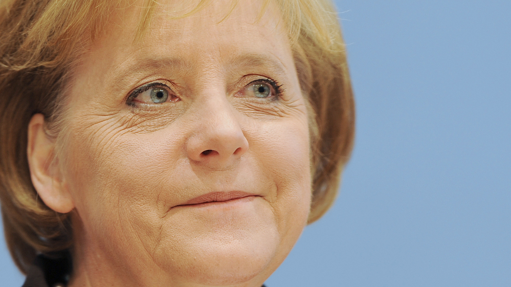 Merkel feiert mit Merck