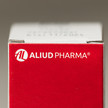 Umkarton eines Arzneimittels mit Aufschrift Aliud Pharma.