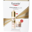 Produktverpackung von Eucerin mit Serum im Pumpspender und einem Tiegel als Geschenk. Aufschrift: „Hyaluron-Filler + Elasticity“, „Verbessert die Elastizität, mildert Pigmentflecken“ sowie der Hinweis „Medizinische Hautpflege“.