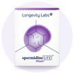 Weiße Faltschachtel spermidineLIFE® Mood+ mit violettem Molekülmotiv und Logo Longevity Labs+, davor zwei dunkelrote Kapseln, vor einem hellvioletten Kreis auf weißem Hintergrund.