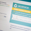 Bildschirm-Anzeige einer Scanacs-Werbung für E-Rezept-Direktabrechnung