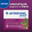 Werbebanner auf lila Hintergrund. Links steht in einem blauen Kreis das Wort ‚Aktion‘. Rechts daneben lautet der Schriftzug: ‚Lebensfreude beginnt im Darm.‘ Darunter ist die Verpackung des Produkts Myrrhinil-Intest® von Repha abgebildet. Auf der Packung stehen Informationen zu den Wirkstoffen und dem Anwendungsgebiet bei Magen-Darm-Störungen sowie eine Illustration grüner Myrrheblätter.