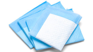 Pflege-HiMi: Apothekenkundin fühlt sich abgeworben Symbolbild: Bettunterlage