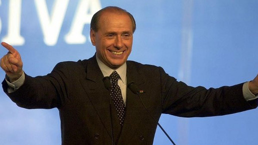 Corona bei Berlusconi und Batman