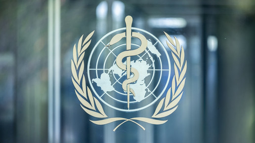 Foto: Das WHO-Logo im Headquarter in Genf